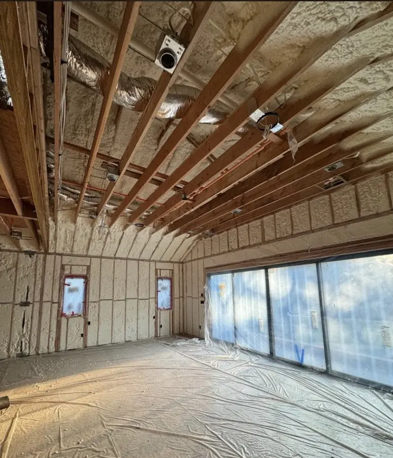 Interior walls and ceiling insulated with spray foam during new construction in South Fulton